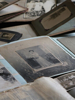Vintage photo albums with old family pictures ready for complete scanning and preservation
