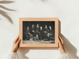 Restored black and white family photo displayed in a wooden frame, perfect as a gift
